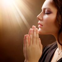 Woman In Prayer